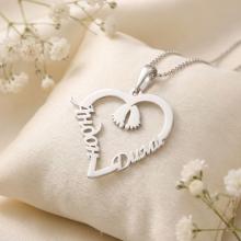 Сребърно колие във формата на сърце с две имена по избор и бебешки стъпки в средата