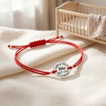 Гривна с червен конец и сребърен елемент с рождените данни на вашето бебе