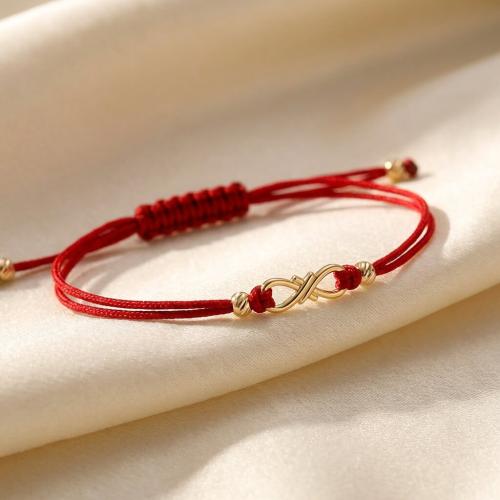 Гривна с червен конец и 14 карата златен елемент безкрайност 