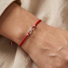 Гривна с червен конец и сребърен елемент безкрайност В49 Гривна с червен конец и сребърен елемент безкрайност В49