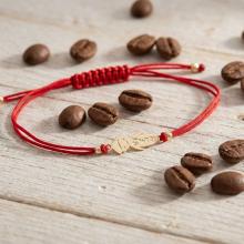 Гривна с червен конец и 14 карата златен елемент момче Гривна с червен конец и 14 карата златен елемент момче