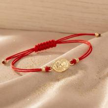 Гривна с червен конец и златен елемент Богородица Гривна с червен конец и златен елемент Богородица