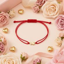 Гривна с червен конец и 14 карата златен елемент мече Гривна с червен конец и 14 карата златен елемент мече