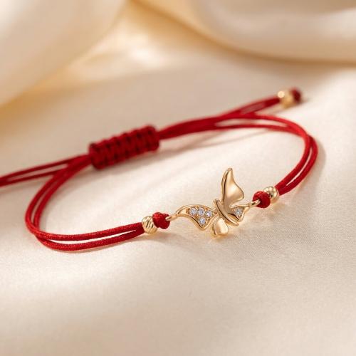 Гривна с червен конец и златен елемент пеперуда с циркони B60