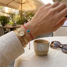 Гривна с червен конец и 14 карата златни топчета с тюркоаз