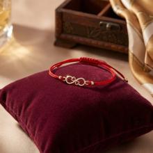 Гривна с червен конец и 14 карата златен елемент безкрайност Гривна с червен конец и 14 карата златен елемент безкрайност