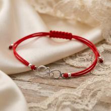 Гривна с червен конец и сребърен елемент безкрайност Гривна с червен конец и сребърен елемент безкрайност