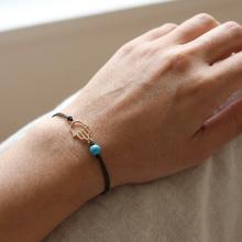 Гривна с черен конец и златен елемент Ръката На Фатима