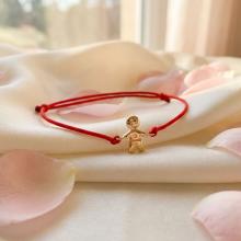 Гривна с червен конец и 14 карата златен елемент момче Гривна с червен конец и 14 карата златен елемент момче