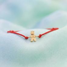 Гривна с червен конец и 14 карата златен елемент момче Гривна с червен конец и 14 карата златен елемент момче