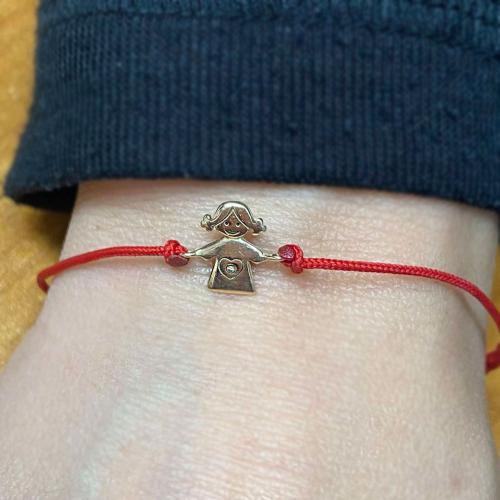 Гривна с червен конец и 14 карата златен елемент момиченце