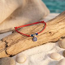 Гривна с червен конец с Dark Heliotrope и сребърен елемент синьо око