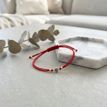 Гривна с червен конец и златен елемент синьо око BT41 Гривна с червен конец и златен елемент синьо око BT41