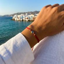 Гривна с червен конец и златен елемент синьо око BT41 Гривна с червен конец и златен елемент синьо око BT41