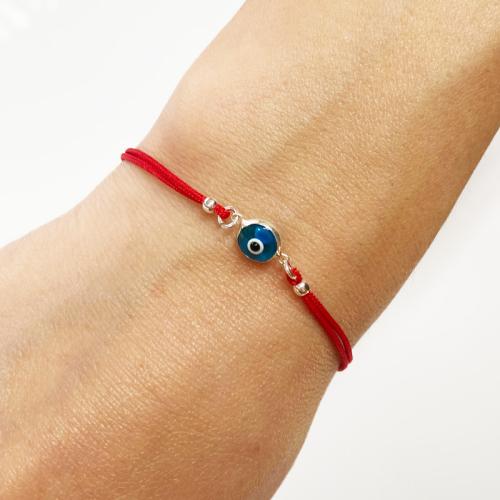 Гривна с червен конец и сребърен елемент синьо око BT95S
