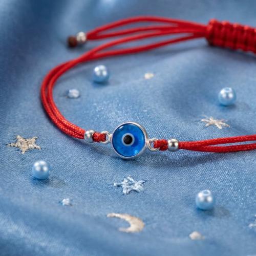 Гривна с червен конец и сребърен елемент синьо око BT95S