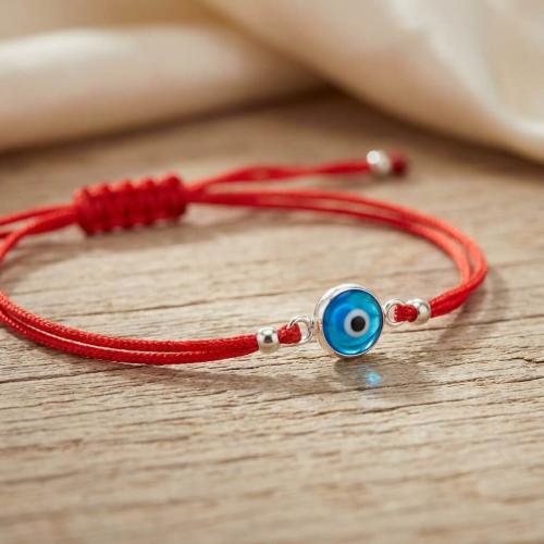 Гривна с червен конец и сребърен елемент синьо око BT95S