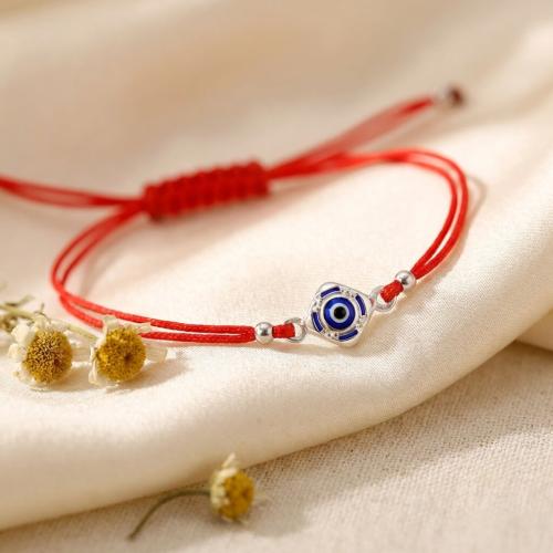 Гривна с червен конец и сребърен елемент синьо око BT96S